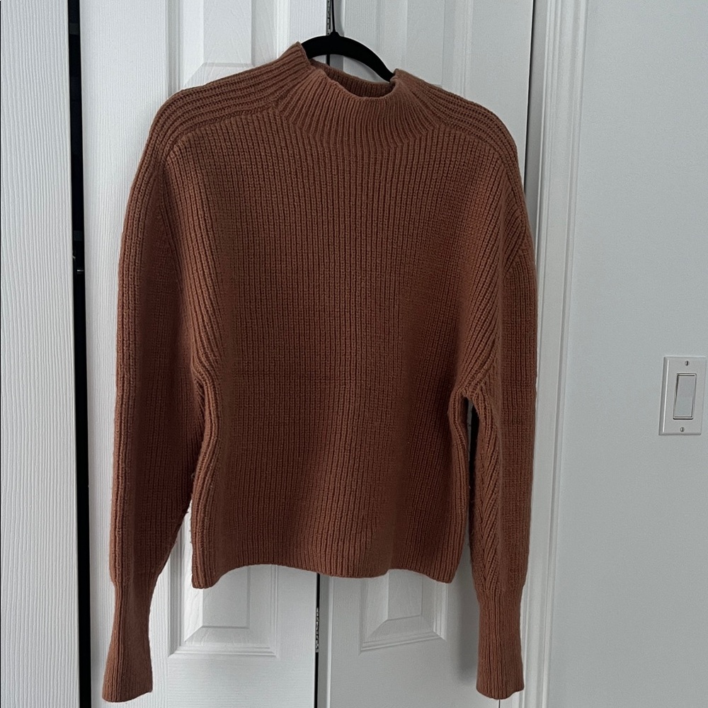 #48.Elegant Tan Turtleneck Sweater